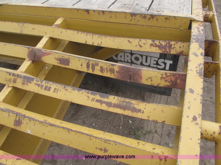 image for item F7028 2003 PJ 28'L deck over tandem axle tag trailer