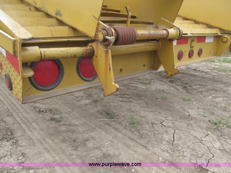 image for item F7028 2003 PJ 28'L deck over tandem axle tag trailer