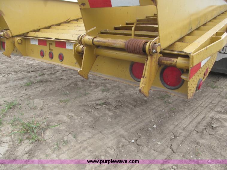 image for item F7028 2003 PJ 28'L deck over tandem axle tag trailer