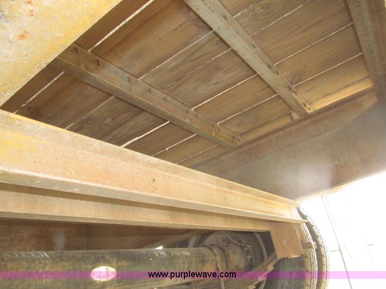 image for item F7028 2003 PJ 28'L deck over tandem axle tag trailer