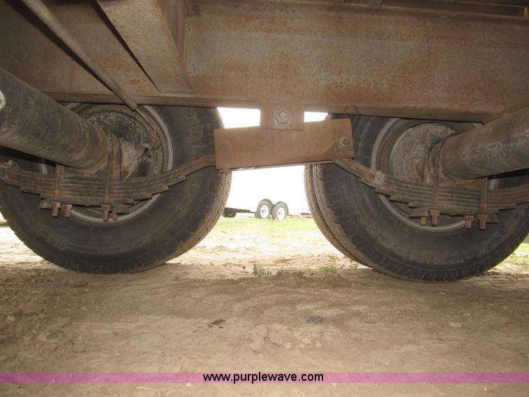 image for item F7028 2003 PJ 28'L deck over tandem axle tag trailer