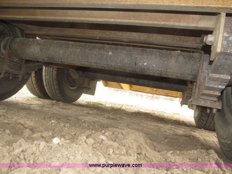 image for item F7028 2003 PJ 28'L deck over tandem axle tag trailer