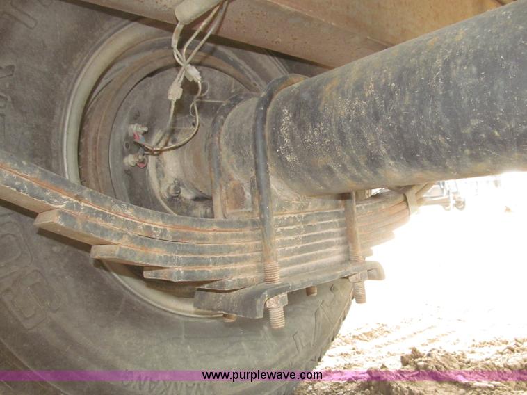 image for item F7028 2003 PJ 28'L deck over tandem axle tag trailer