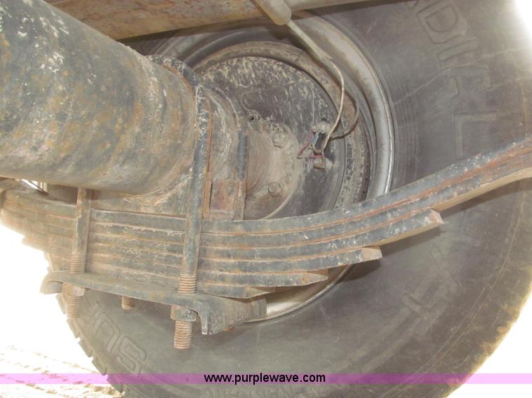 image for item F7028 2003 PJ 28'L deck over tandem axle tag trailer