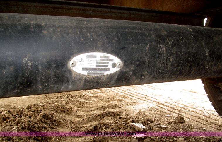 image for item F7028 2003 PJ 28'L deck over tandem axle tag trailer