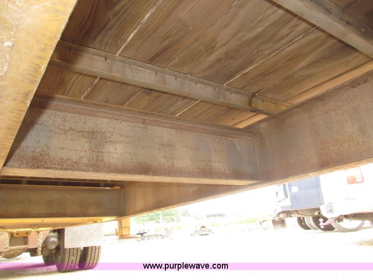 image for item F7028 2003 PJ 28'L deck over tandem axle tag trailer