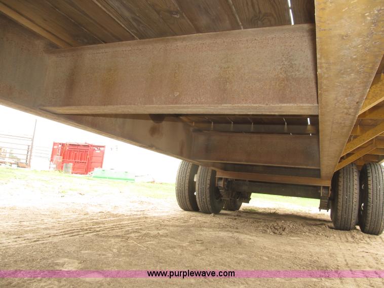 image for item F7028 2003 PJ 28'L deck over tandem axle tag trailer