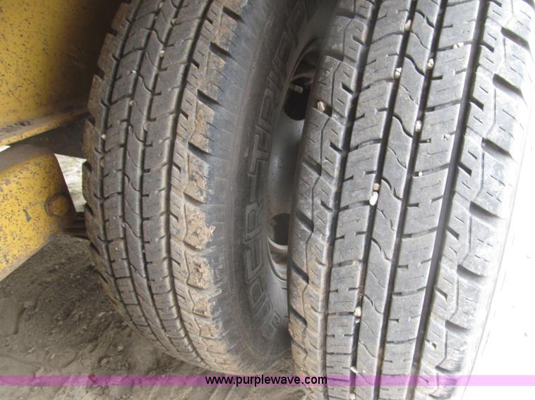 image for item F7028 2003 PJ 28'L deck over tandem axle tag trailer