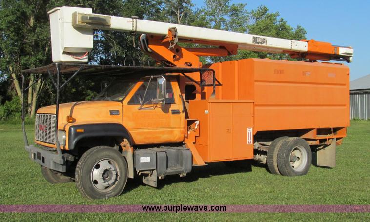image for item G2038 1999 GMC C7500 bucket/tree trimming truck