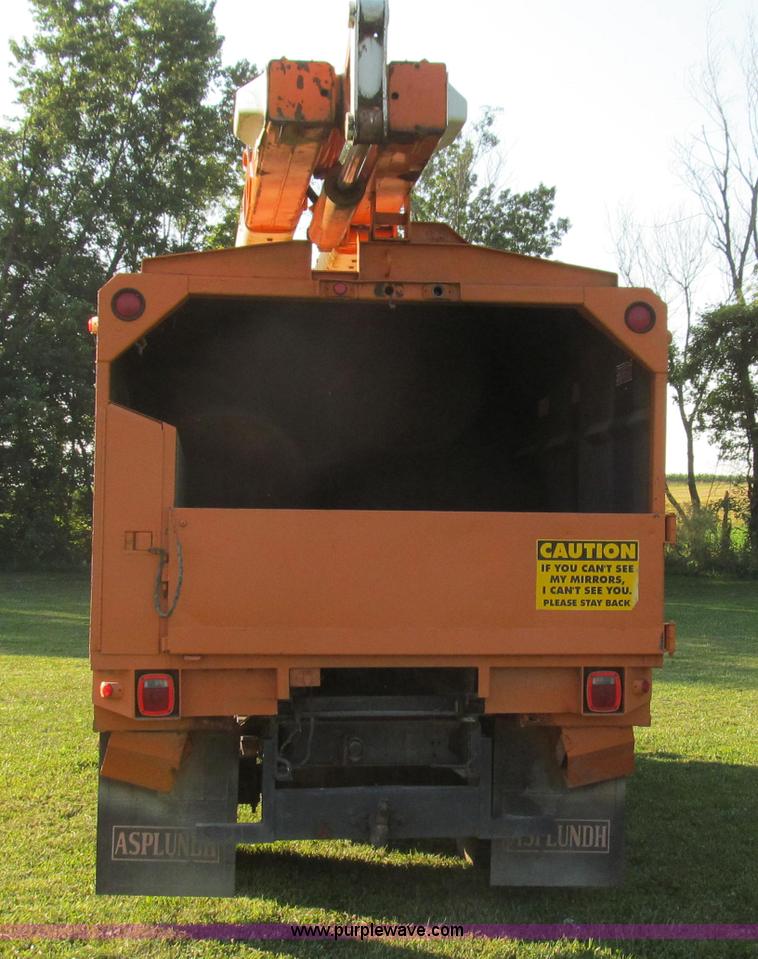 image for item G2038 1999 GMC C7500 bucket/tree trimming truck