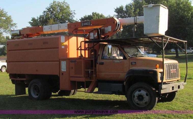 image for item G2038 1999 GMC C7500 bucket/tree trimming truck