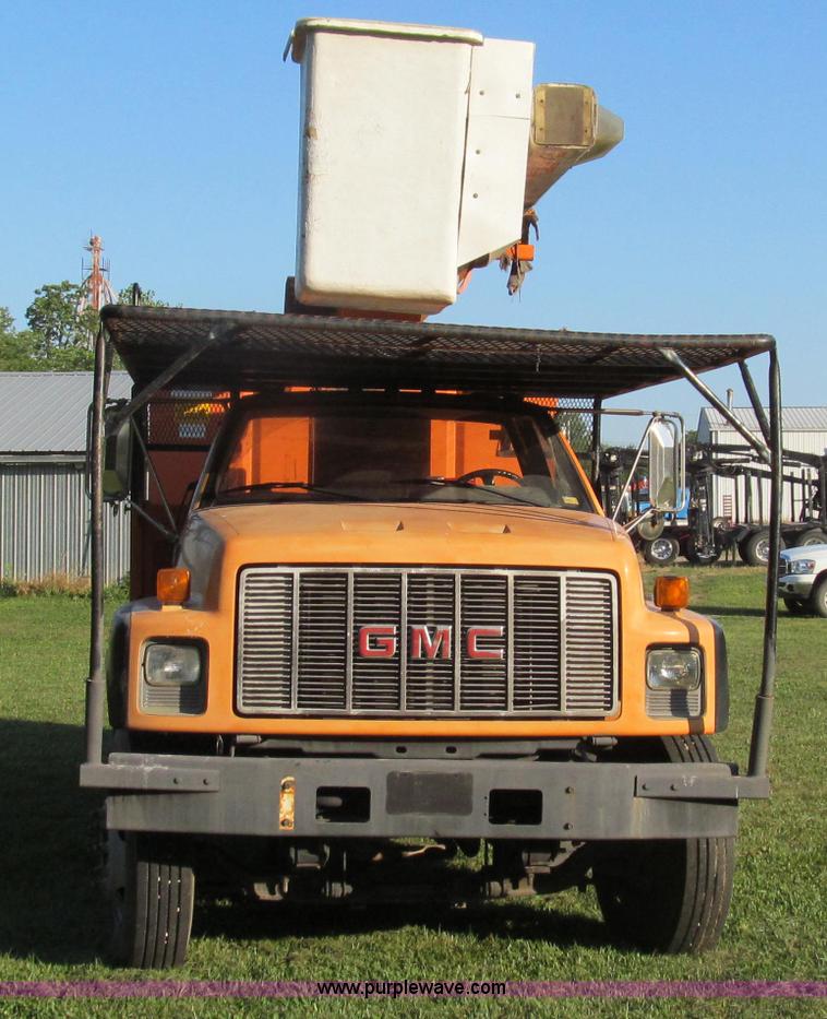 image for item G2038 1999 GMC C7500 bucket/tree trimming truck