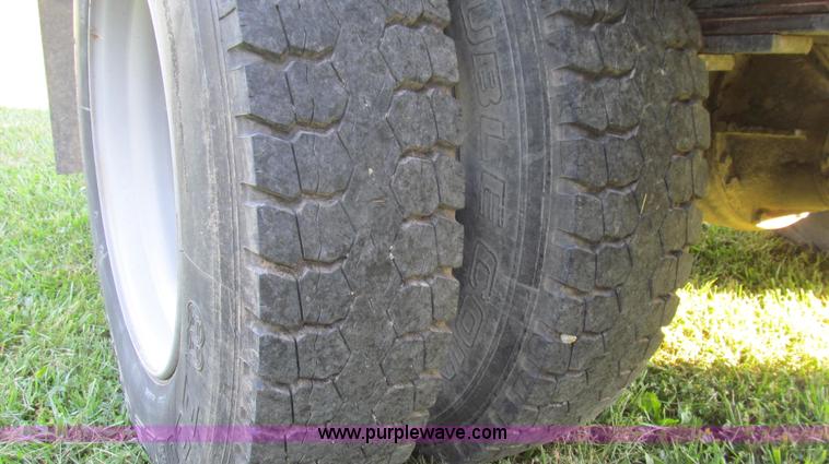 image for item G2038 1999 GMC C7500 bucket/tree trimming truck