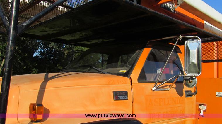 image for item G2038 1999 GMC C7500 bucket/tree trimming truck