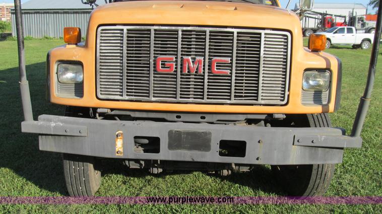 image for item G2038 1999 GMC C7500 bucket/tree trimming truck