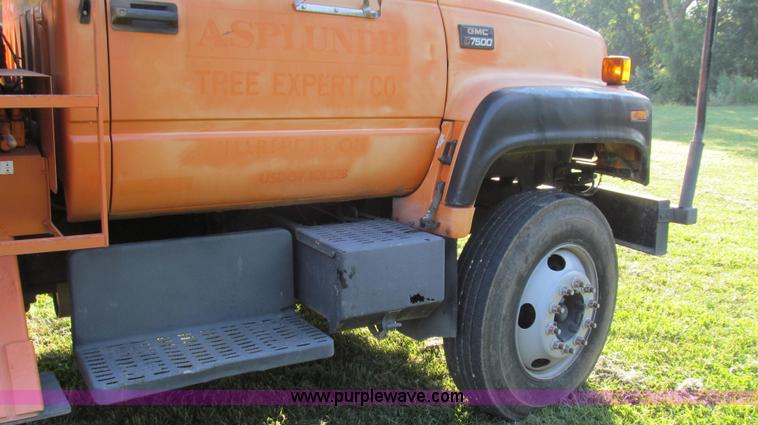 image for item G2038 1999 GMC C7500 bucket/tree trimming truck