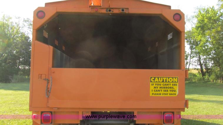 image for item G2038 1999 GMC C7500 bucket/tree trimming truck