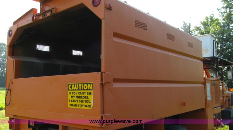 image for item G2038 1999 GMC C7500 bucket/tree trimming truck