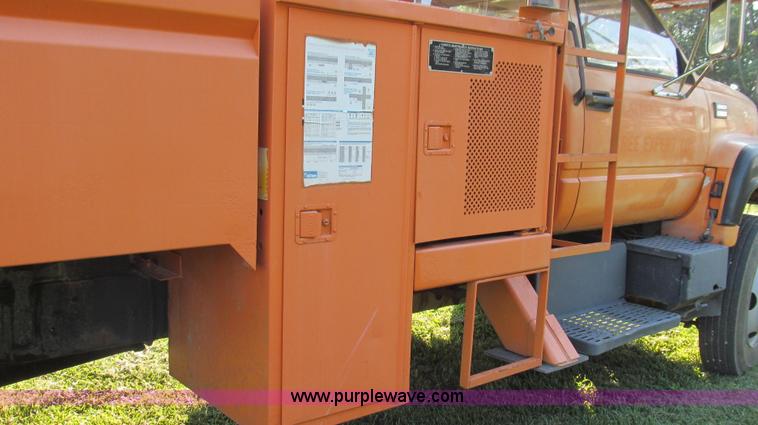 image for item G2038 1999 GMC C7500 bucket/tree trimming truck