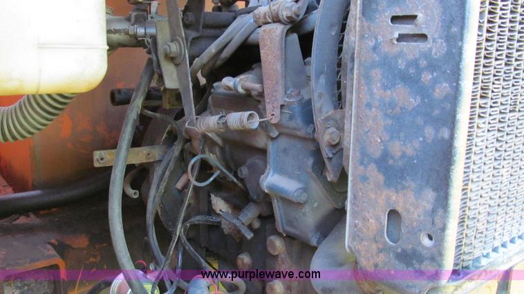 image for item G2038 1999 GMC C7500 bucket/tree trimming truck