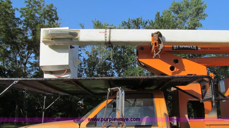 image for item G2038 1999 GMC C7500 bucket/tree trimming truck
