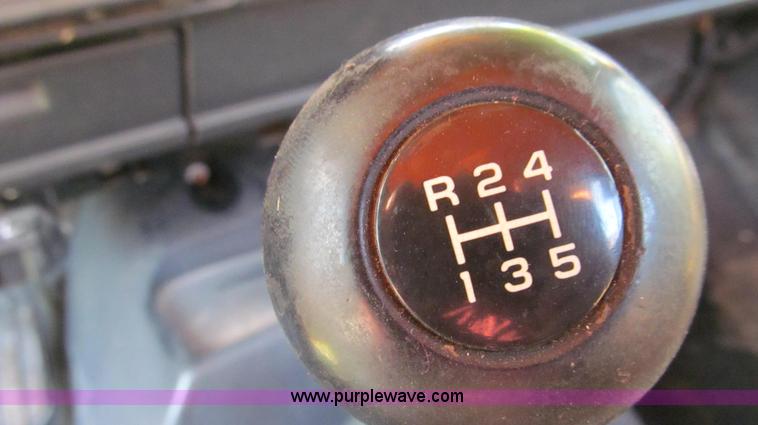 image for item G2038 1999 GMC C7500 bucket/tree trimming truck