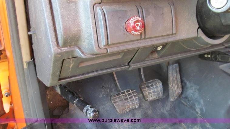 image for item G2038 1999 GMC C7500 bucket/tree trimming truck