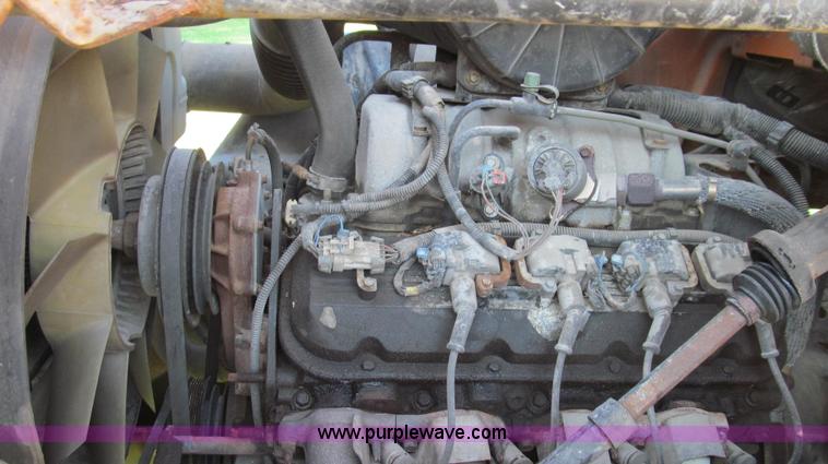 image for item G2038 1999 GMC C7500 bucket/tree trimming truck