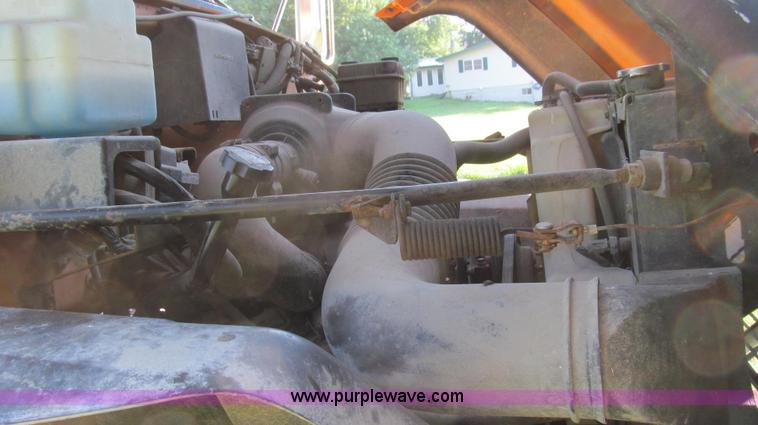 image for item G2038 1999 GMC C7500 bucket/tree trimming truck