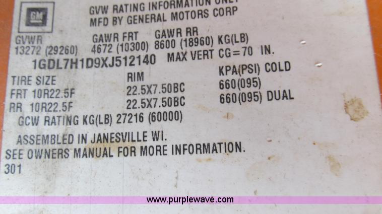 image for item G2038 1999 GMC C7500 bucket/tree trimming truck