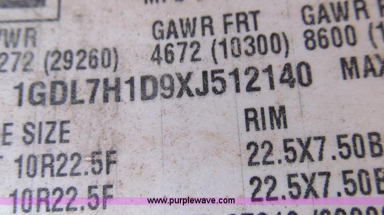 image for item G2038 1999 GMC C7500 bucket/tree trimming truck