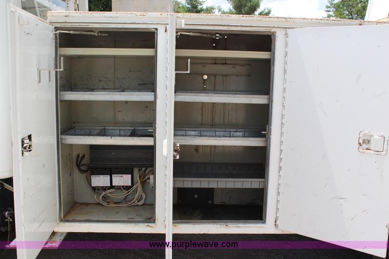 image for item G5391 1999 International 4700 digger derrick truck