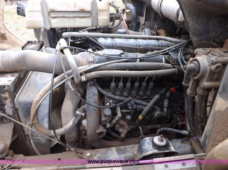 image for item H7169 1998 Mack CS200P semi truck