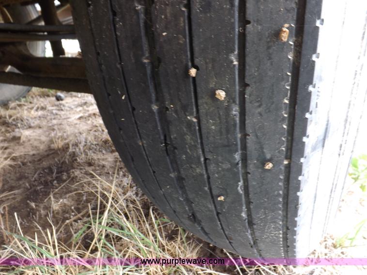 image for item H7169 1998 Mack CS200P semi truck