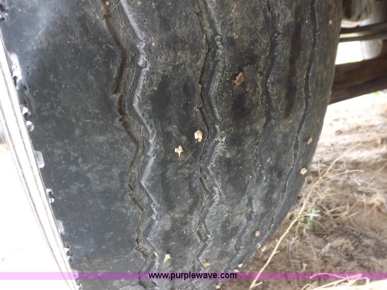 image for item H7169 1998 Mack CS200P semi truck