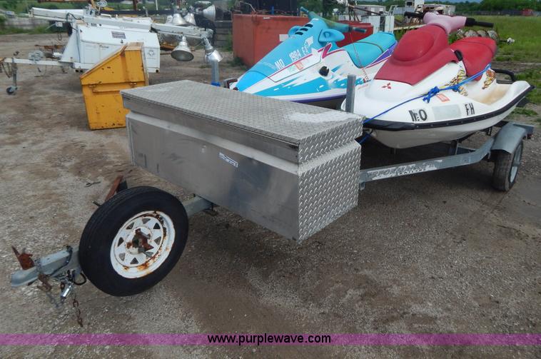 image for item AE9861 Two personal watercrafts and trailer