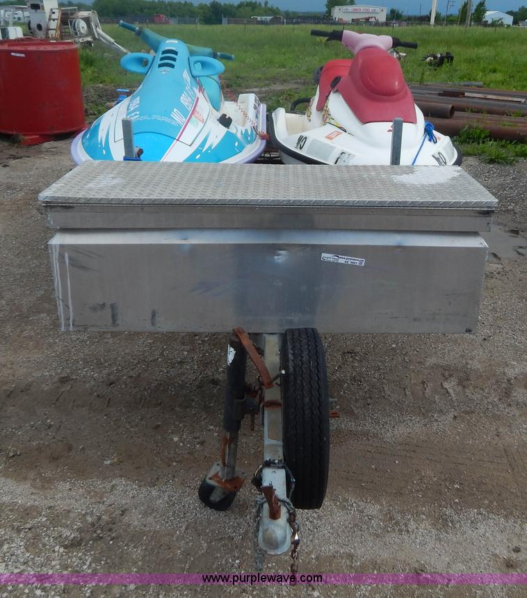 image for item AE9861 Two personal watercrafts and trailer
