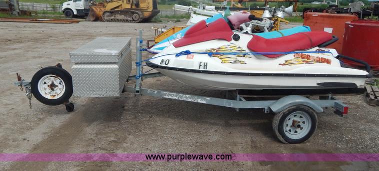 image for item AE9861 Two personal watercrafts and trailer