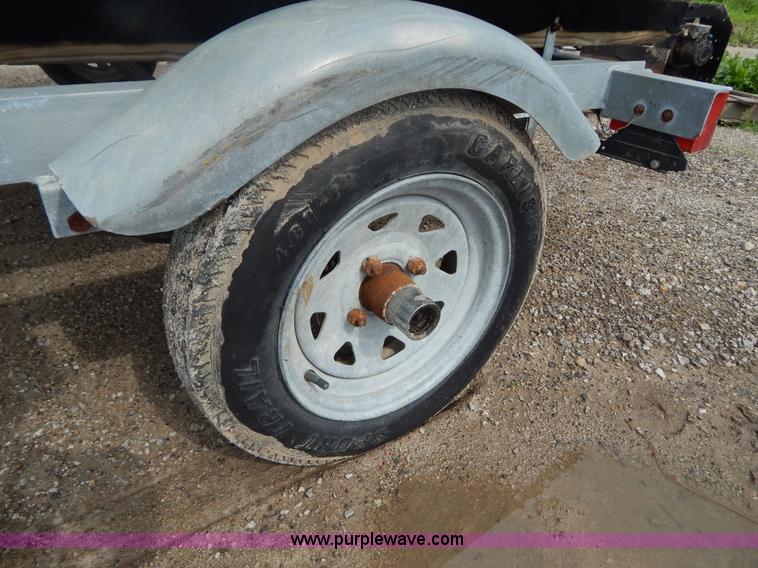 image for item AE9861 Two personal watercrafts and trailer