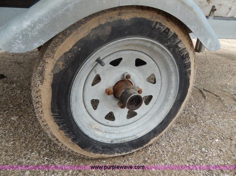 image for item AE9861 Two personal watercrafts and trailer