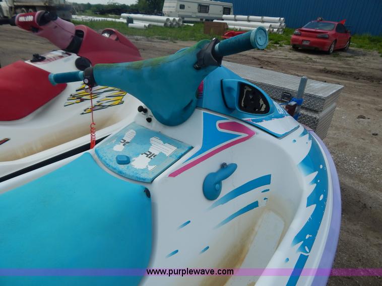 image for item AE9861 Two personal watercrafts and trailer