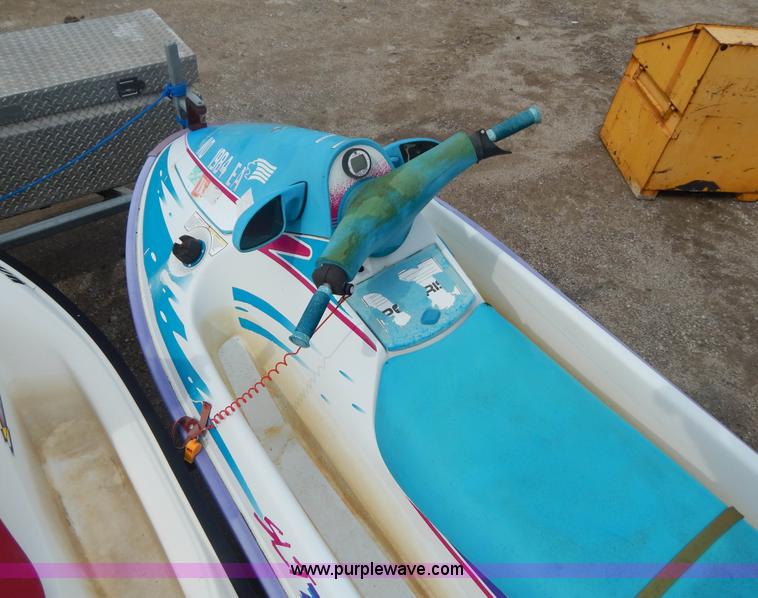 image for item AE9861 Two personal watercrafts and trailer