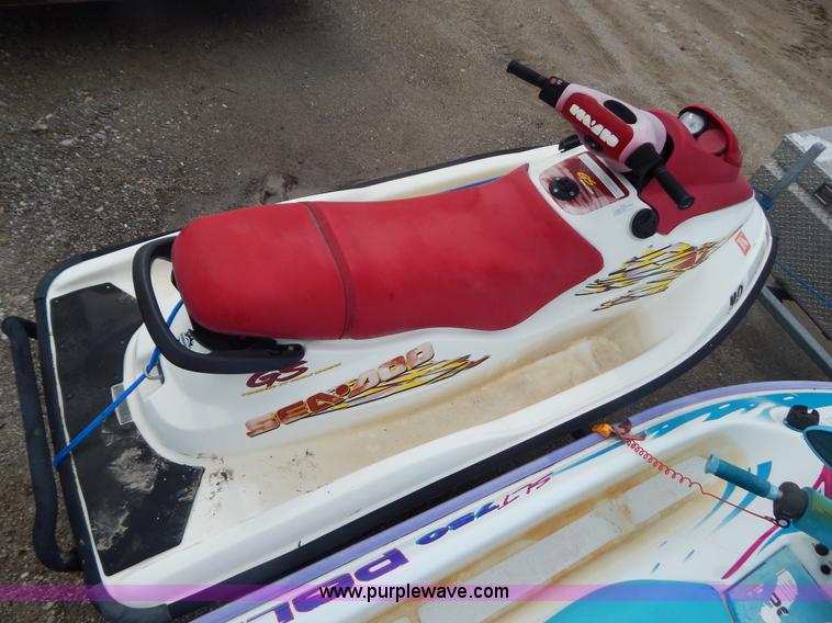 image for item AE9861 Two personal watercrafts and trailer