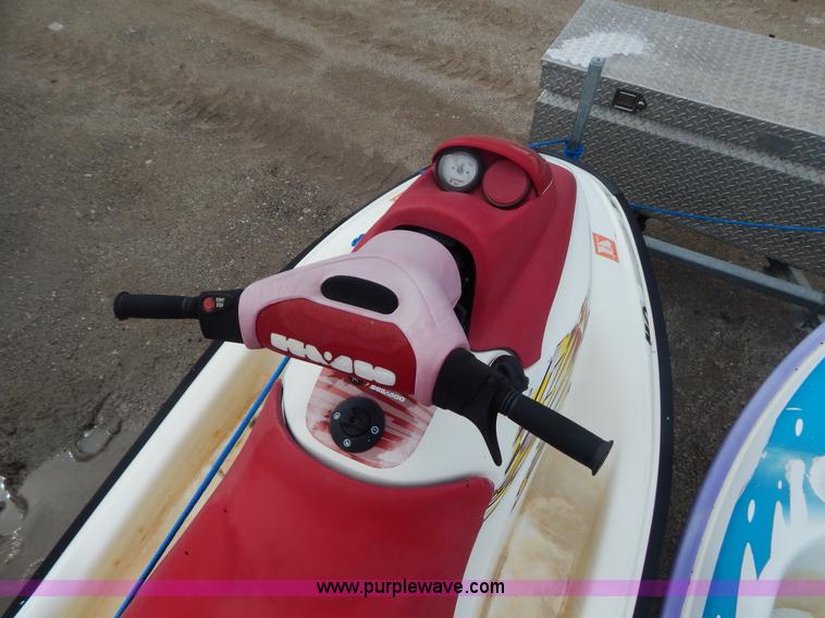 image for item AE9861 Two personal watercrafts and trailer