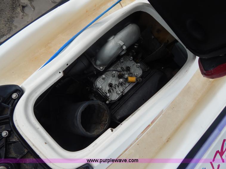 image for item AE9861 Two personal watercrafts and trailer