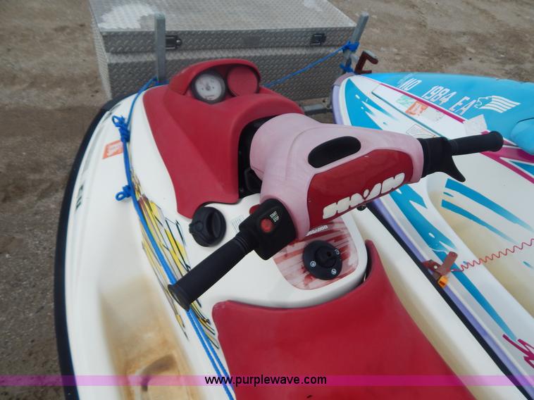 image for item AE9861 Two personal watercrafts and trailer