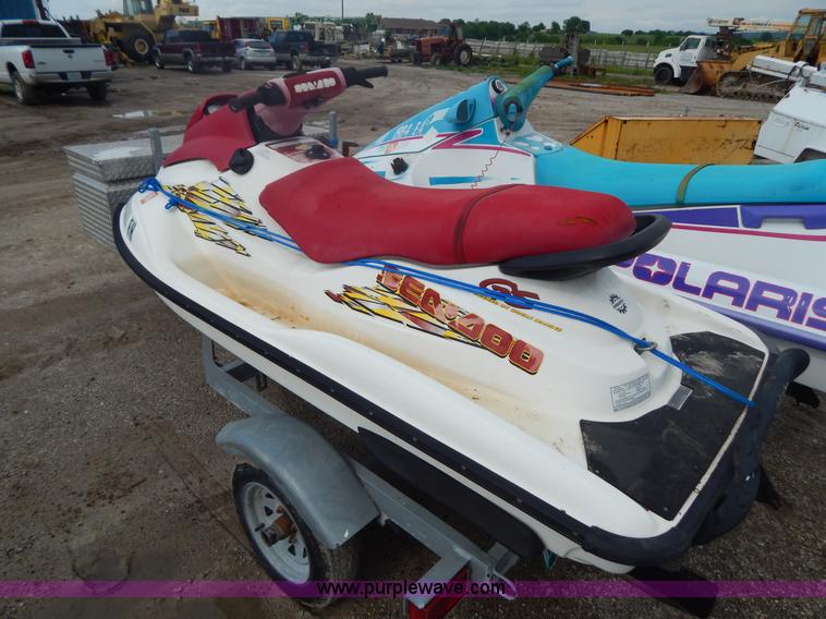 image for item AE9861 Two personal watercrafts and trailer