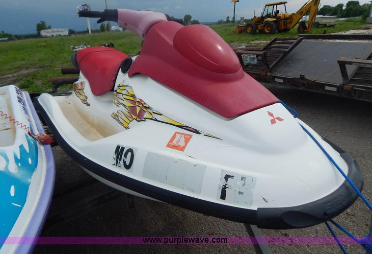 image for item AE9861 Two personal watercrafts and trailer
