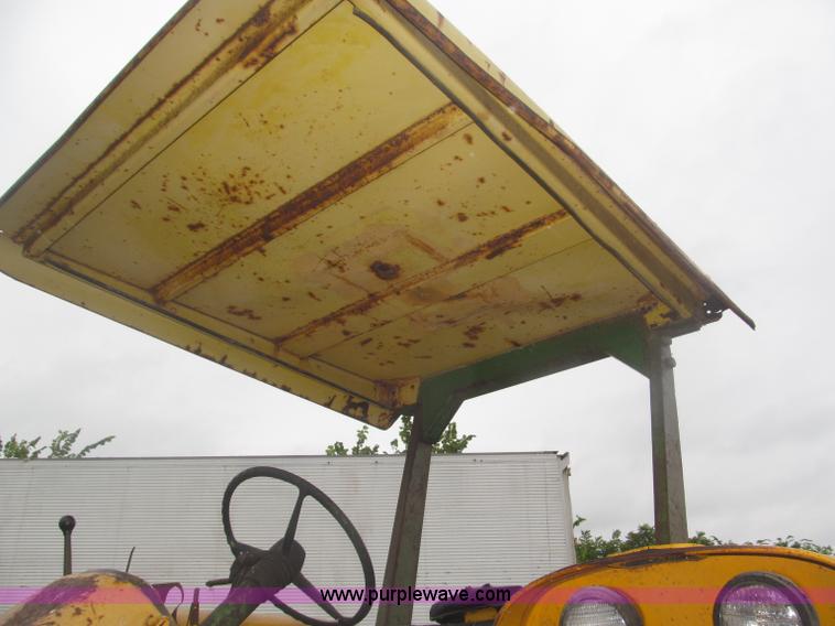 image for item F7054 John Deere 700 tractor