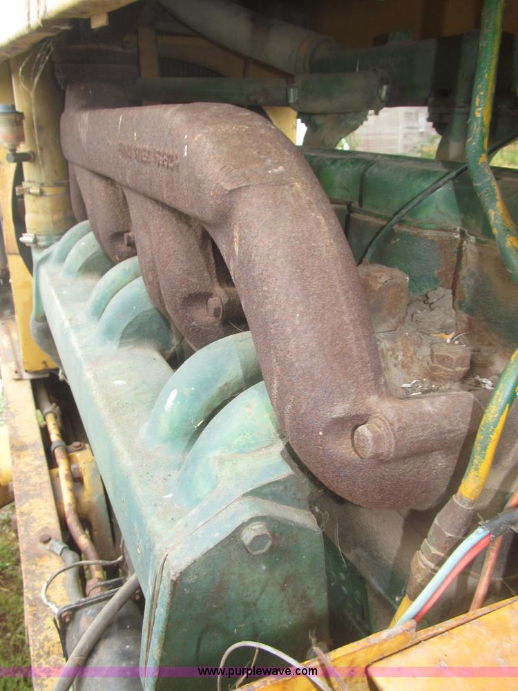 image for item F7054 John Deere 700 tractor